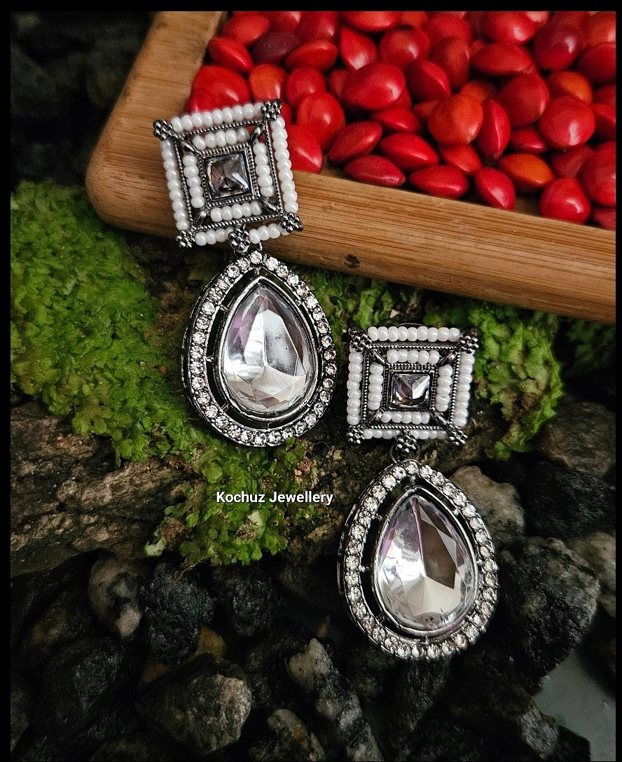 EAR1126 - Black Metal Finish Kundan Danglers