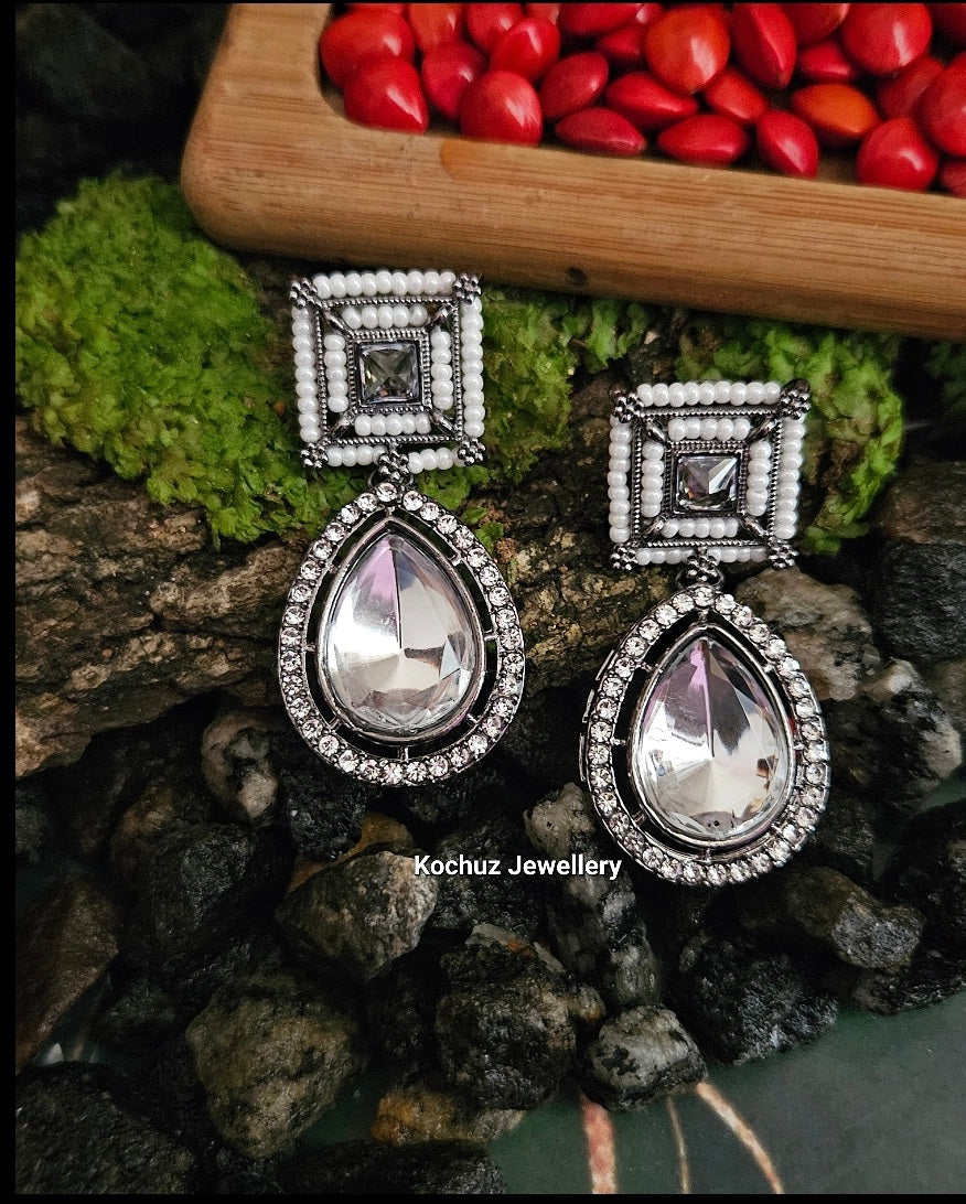 EAR1126 - Black Metal Finish Kundan Danglers